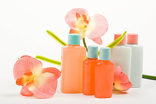 plastic bottles with orchid flowers
